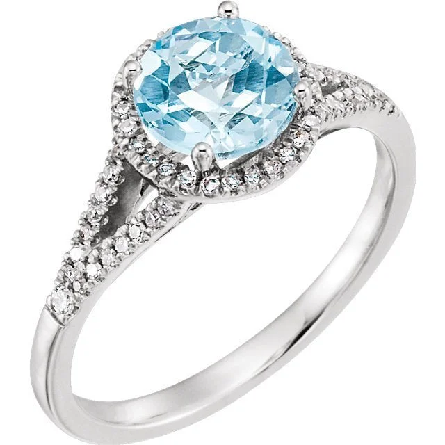 14KT WHITE GOLD 1.65 CT BLUE TOPAZ & 1/6CTW DIAMOND HALO RING