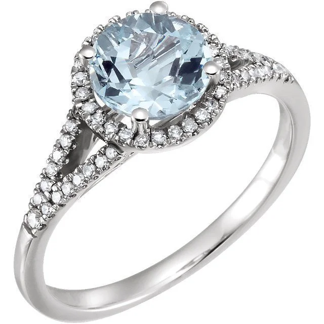 14KT WHITE GOLD 1.60 CT AQUAMARINE & 1/6 CTW DIAMOND HALO RING