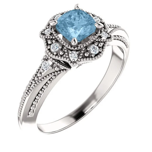 14KT WHITE GOLD 3/4 CT SKY BLUE TOPAZ & 0.08 CTW DIAMOND ACCENT VINTAGE RING