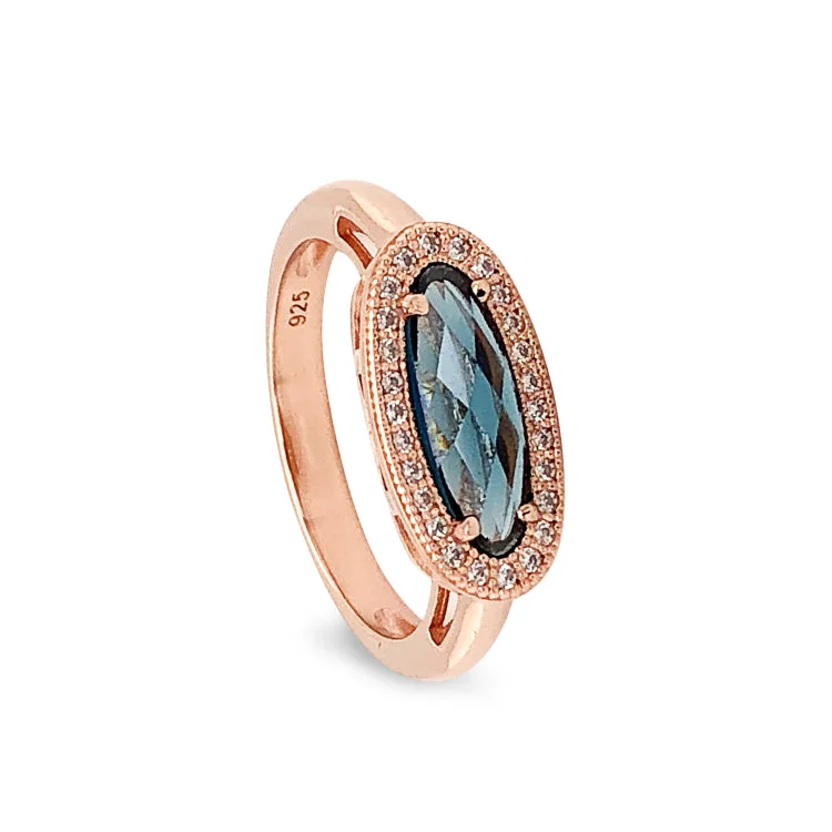 Rose Gold Finish Sterling Silver Micropave Oblong Ring with Simulated London Blue Topaz and Simulated Diamonds